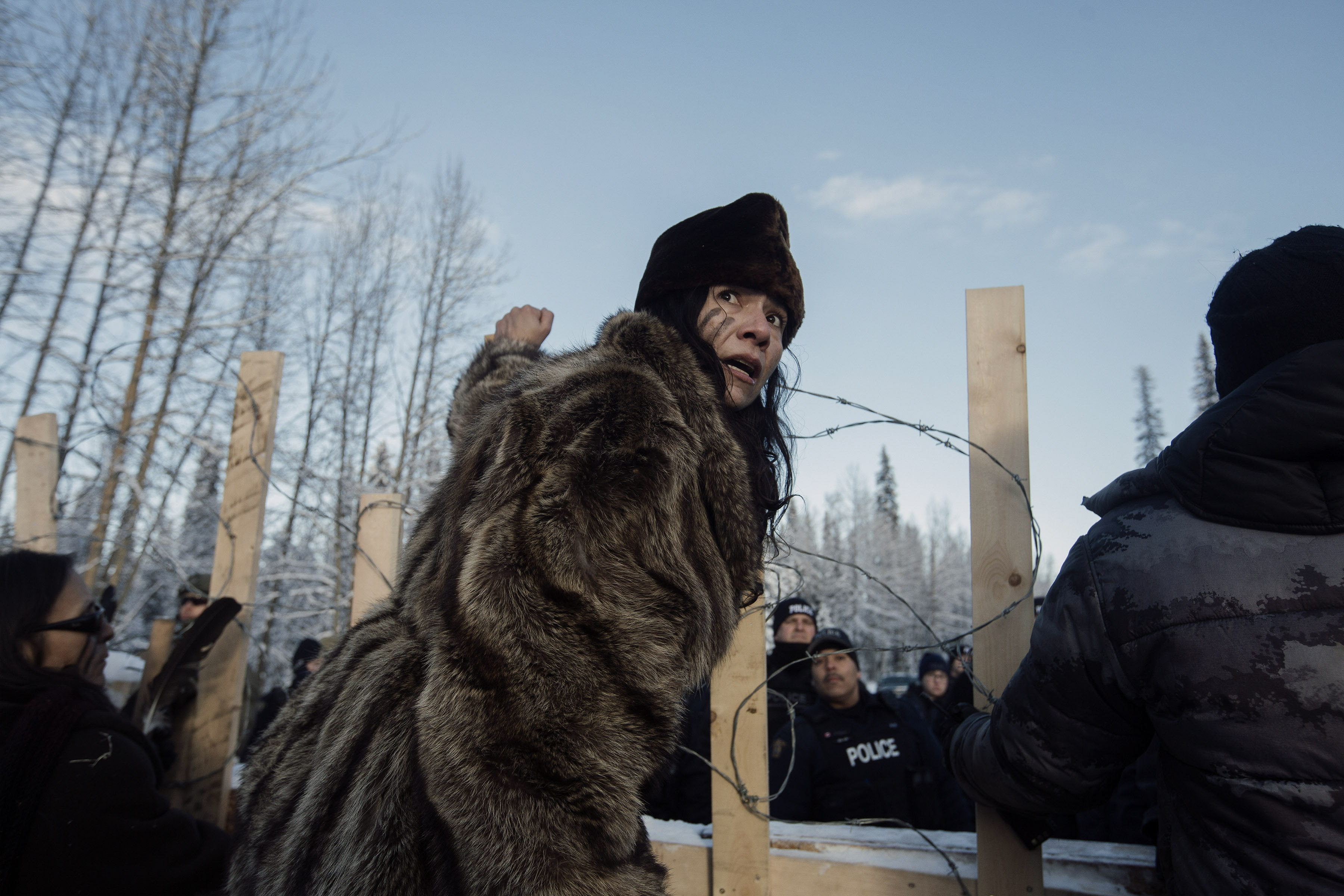 Sabina Dennis holds ground at the Gidimt’en Checkpoint barricade while police enforce Coastal Gaslink’s injunction.